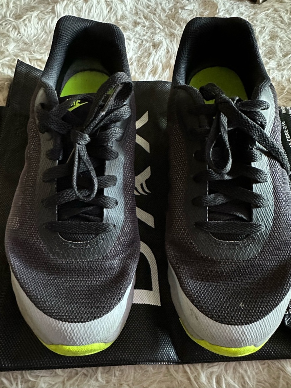 Nike Women’s Black Athletic Shoes with Lime Accents
